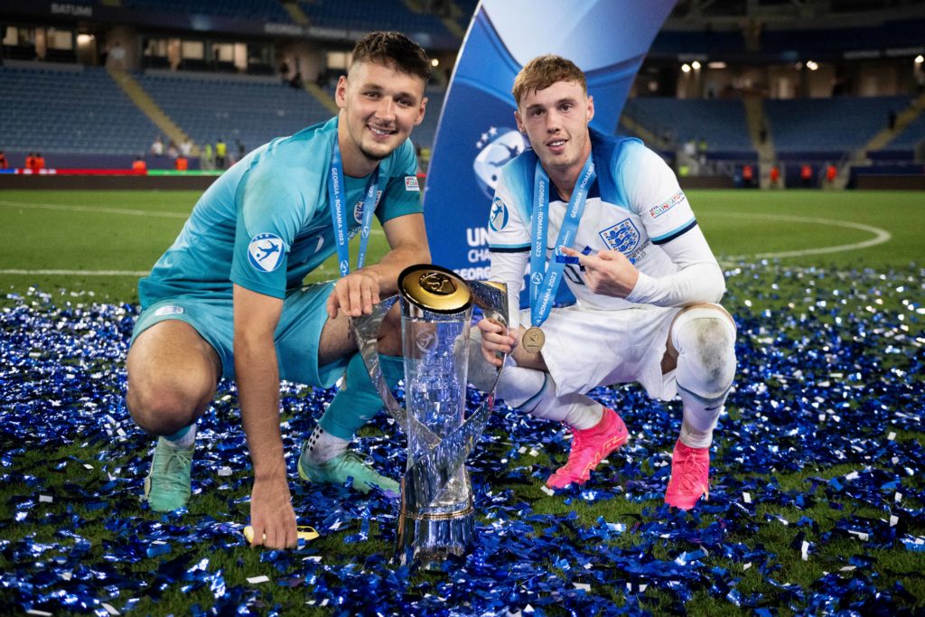 James Trafford and Cole Palmer pose with the Under21 Euros trophy.