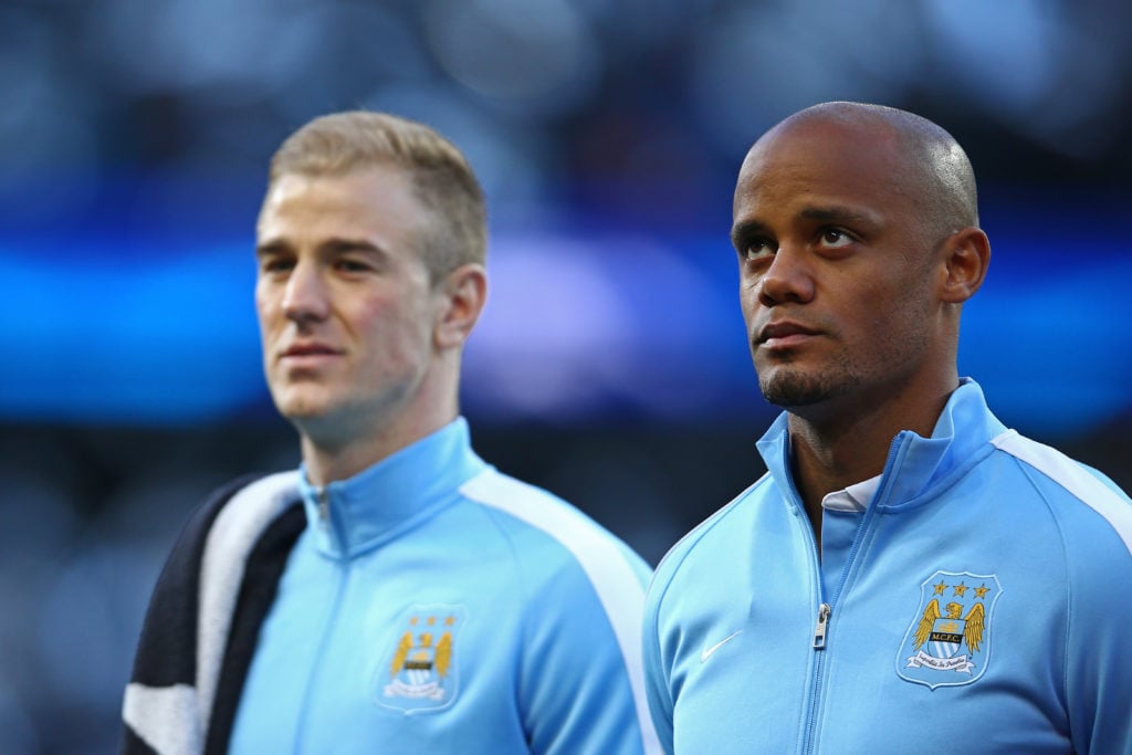 Joe Hart and Vincent Kompany of Manchester City line up prior to kickoff during the UEFA Champions League Semi Final first leg match between Manchester City FC and Real Madrid at the Etihad Stadium on April 26, 2016