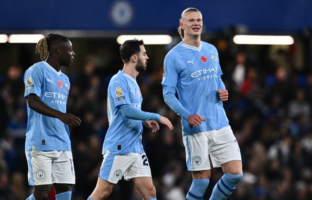 Jeremy Doku, Bernardo Silva, Erling Haaland of Manchester City during the Premier League match between Chelsea FC and Manchester City at Stamford Bridge on November 12, 2023