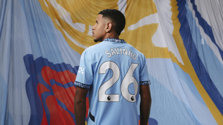 Savinho of Manchester City signs for Manchester City at Manchester City Football Academy on July 18, 2024 in Manchester, England. (