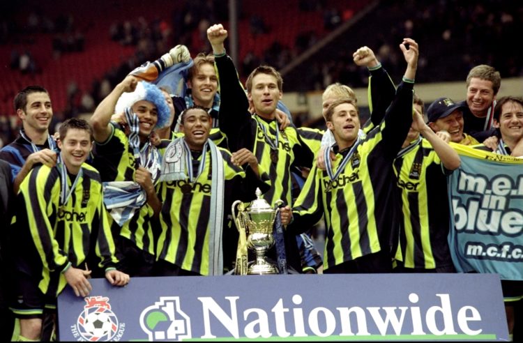 30 May 1999: Manchester City players celebrate promotion and victory after the Nationwide Division Two Play-Off Final match against Gillingham pl...