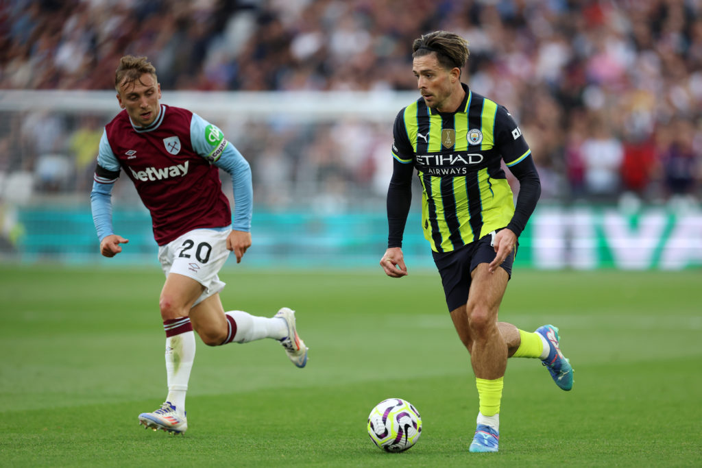 Jarrod Bowen defending against Jack Grealish during West Ham United vs Manchester City