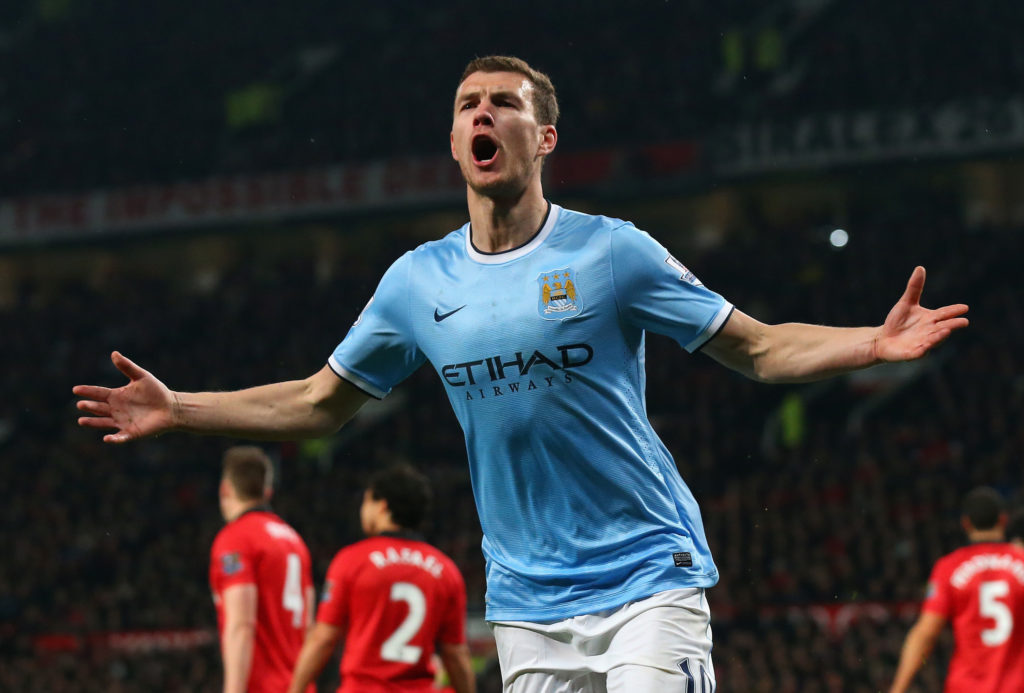 Edin Dzeko celebrates after scoring vs Man United