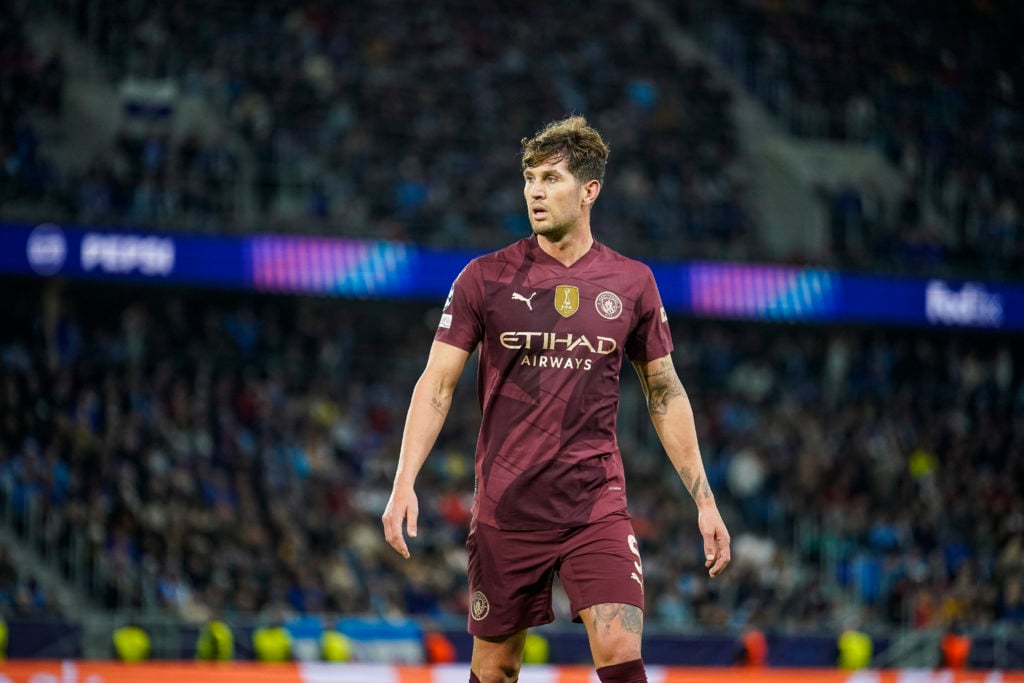 John Stones playing for Manchester City.