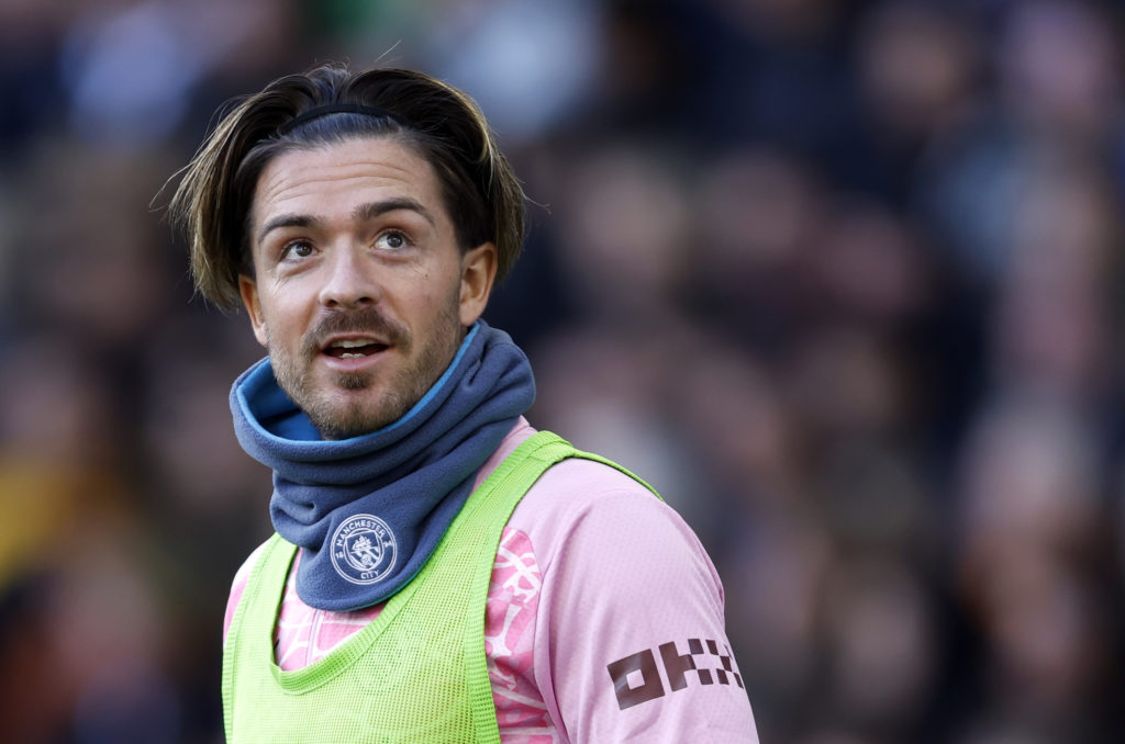 Jack Grealish warms up during Wolverhampton Wanderers v Manchester City.