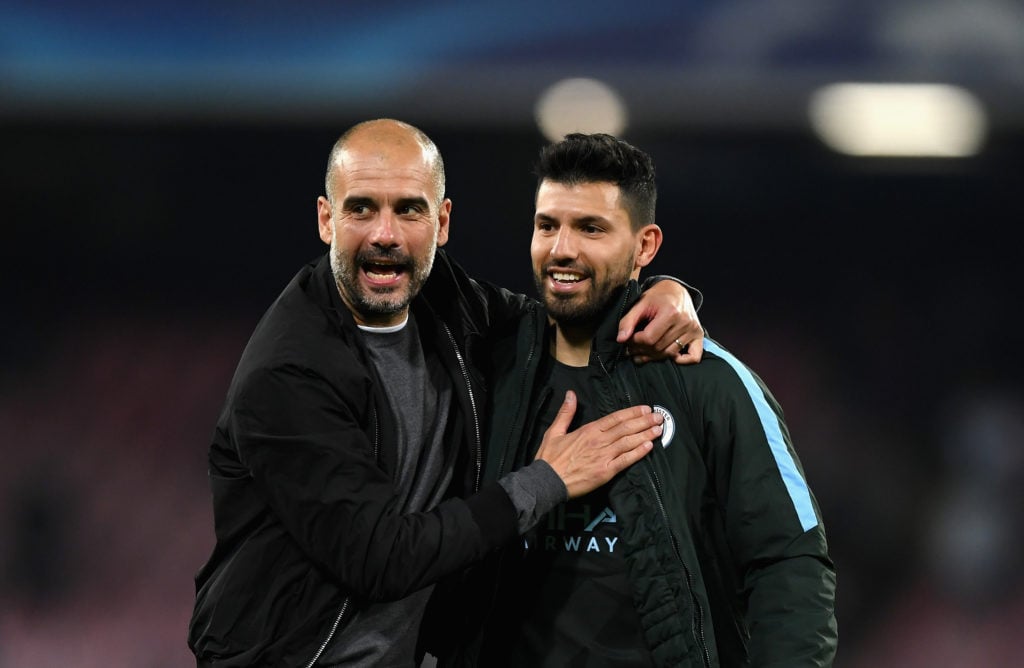 Pep Guardiola, Manager of Manchester City and Sergio Aguero of Manchester City embrace after the UEFA Champions League group F match between SSC Napoli and Manchester City at Stadio San Paolo on November 1, 2017