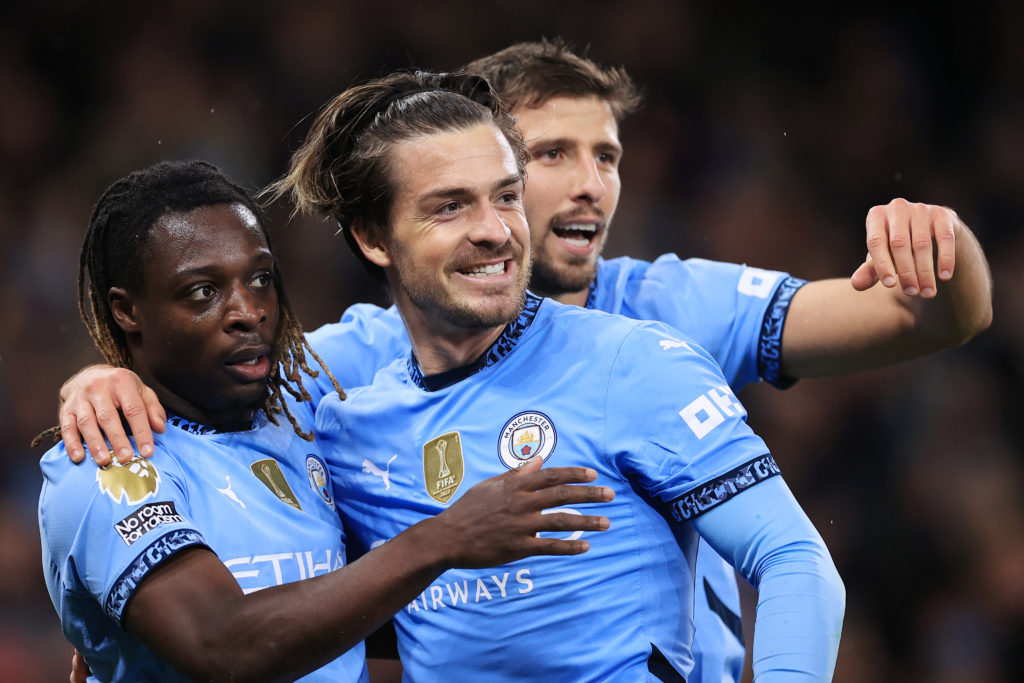 Jack Grealish, Jeremy Doku and Ruben Dias in action during Manchester City vs Nottingham Forest