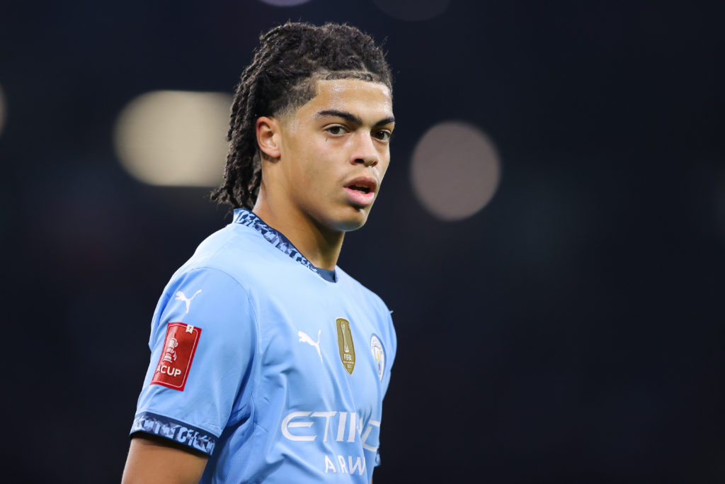 Jahmai Simpson-Pusey in action for Manchester City v Salford City.