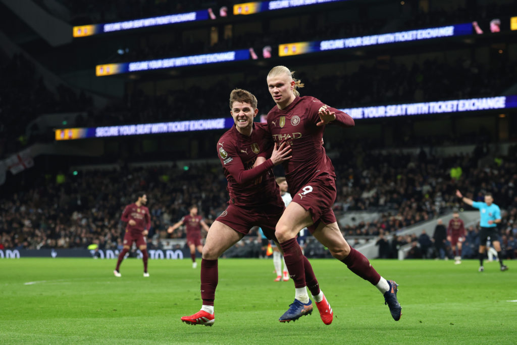 James McAtee celebrates with Erling Haaland during Manchester City's win against Tottenham Hotspur