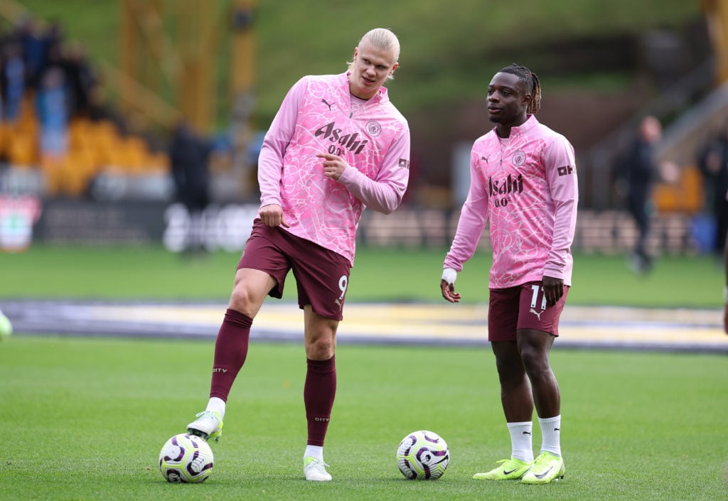 Erling Haaland and Jeremy Doku warming up ahead of Manchester City vs Wolves