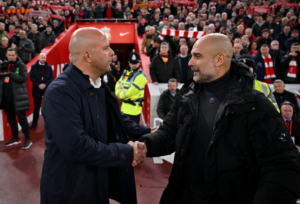 Arne Slot and Pep Guardiola shake hands before Liverpool v Manchester City.