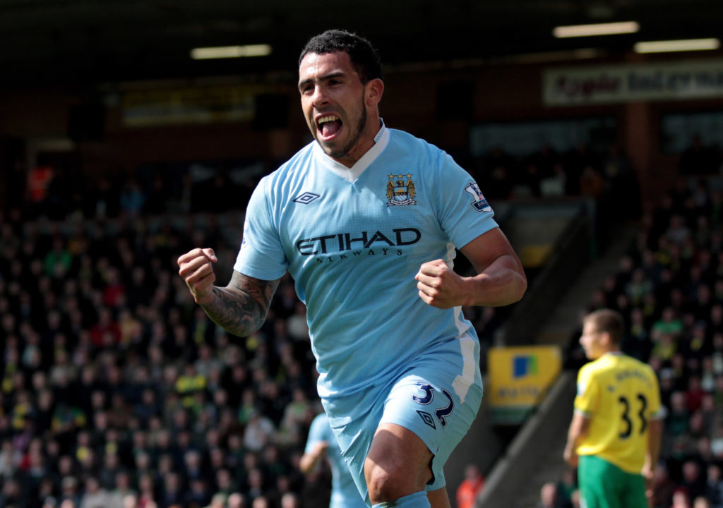 Carlos Tevez celebrates a goal in Norwich City v Manchester City.