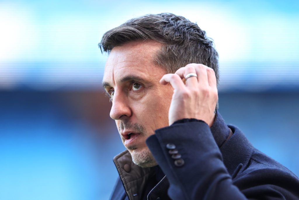 Gary Neville doing punditry work at a Man City game