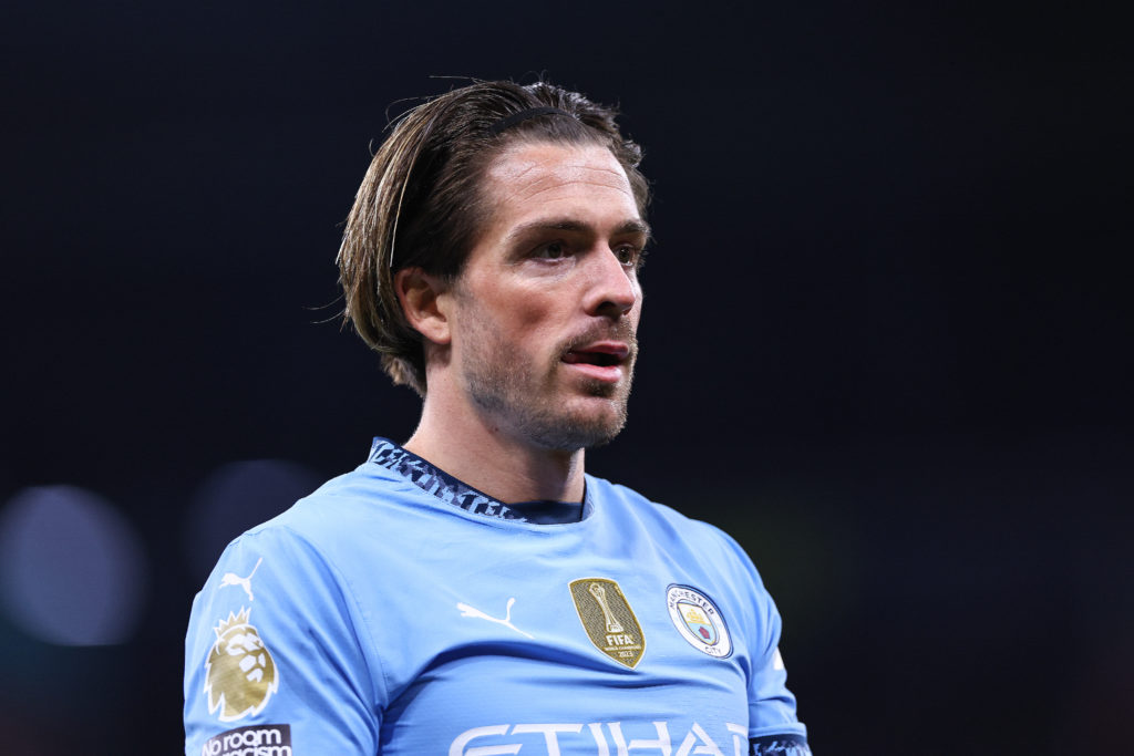 Jack Grealish in action for Manchester City v Manchester United.