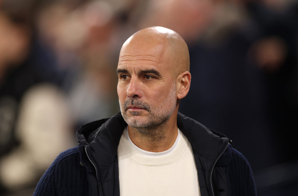 Manchester City manager Pep Guardiola looks on against Club Brugge