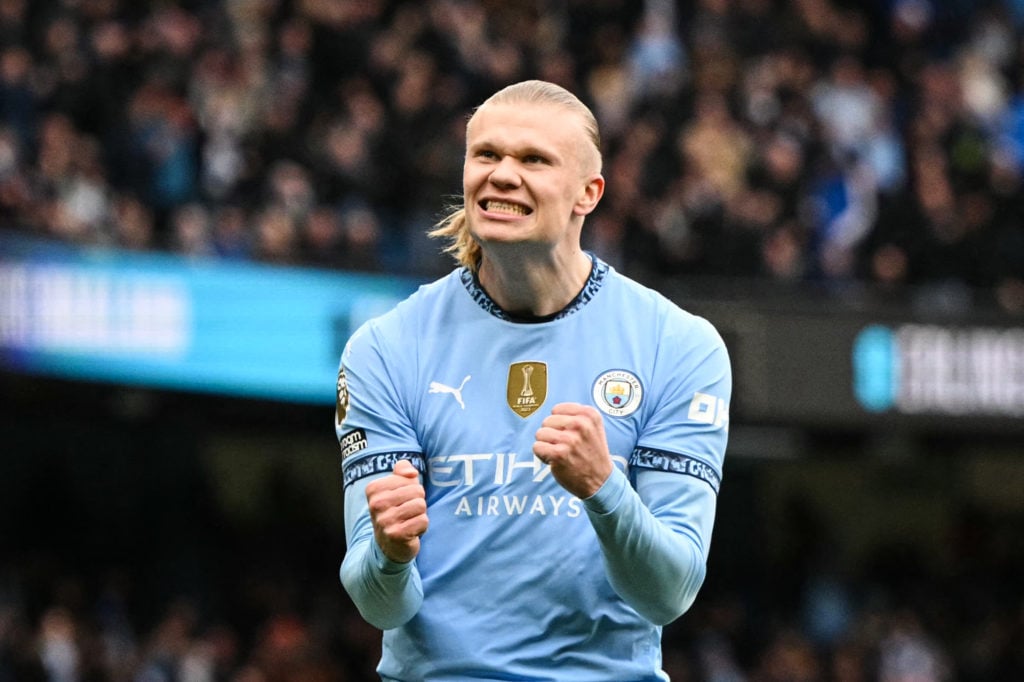 Erling Haaland celebrates scoring for Manchester City.