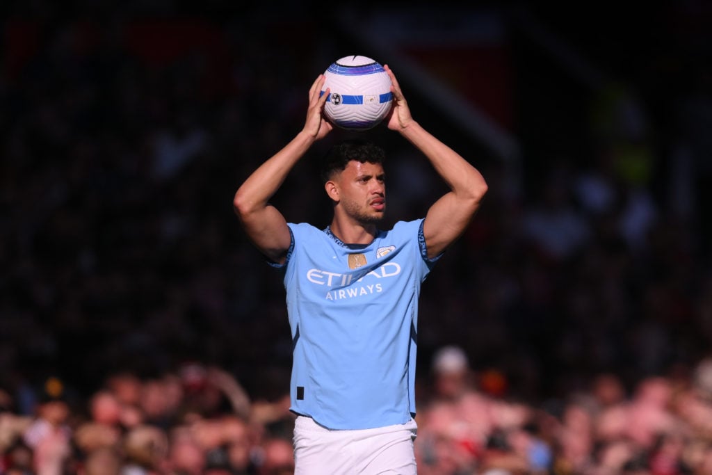 Matheus Nunes of Manchester City takes a throw in during the Premier League match between Manchester United FC and Manchester City FC at Old Trafford on April 06, 2025
