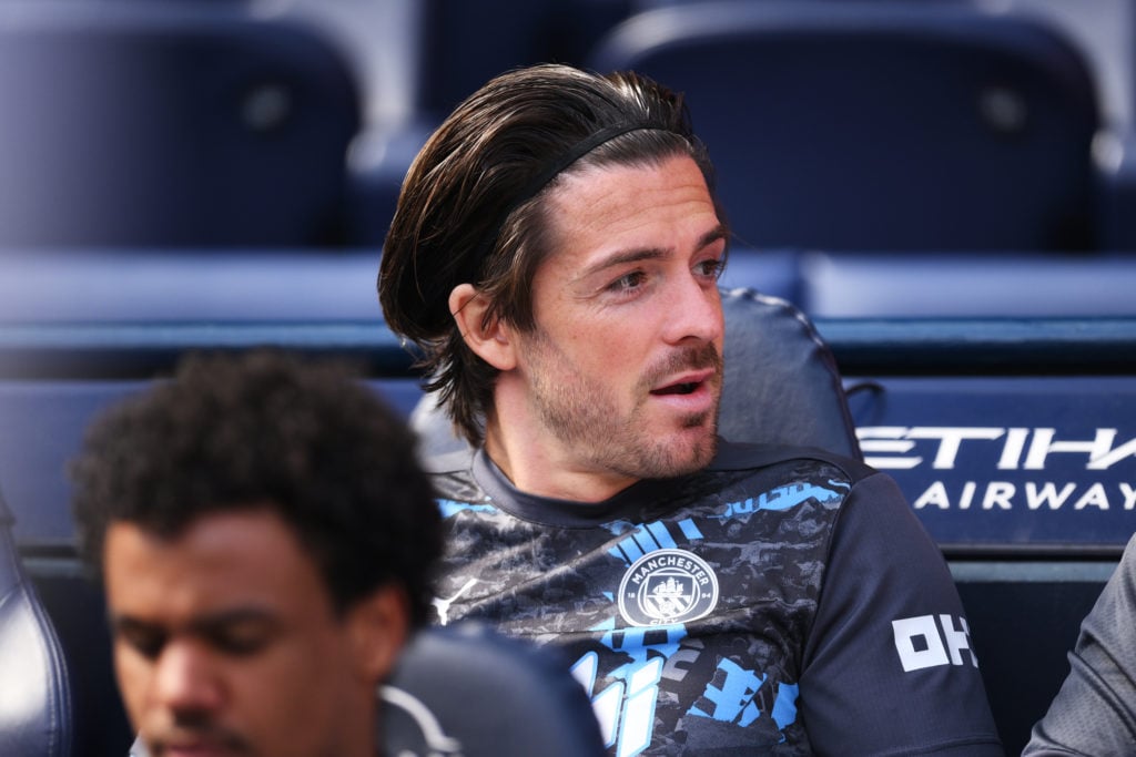 Jack Grealish sits on the bench during Manchester City v Crystal Palace.