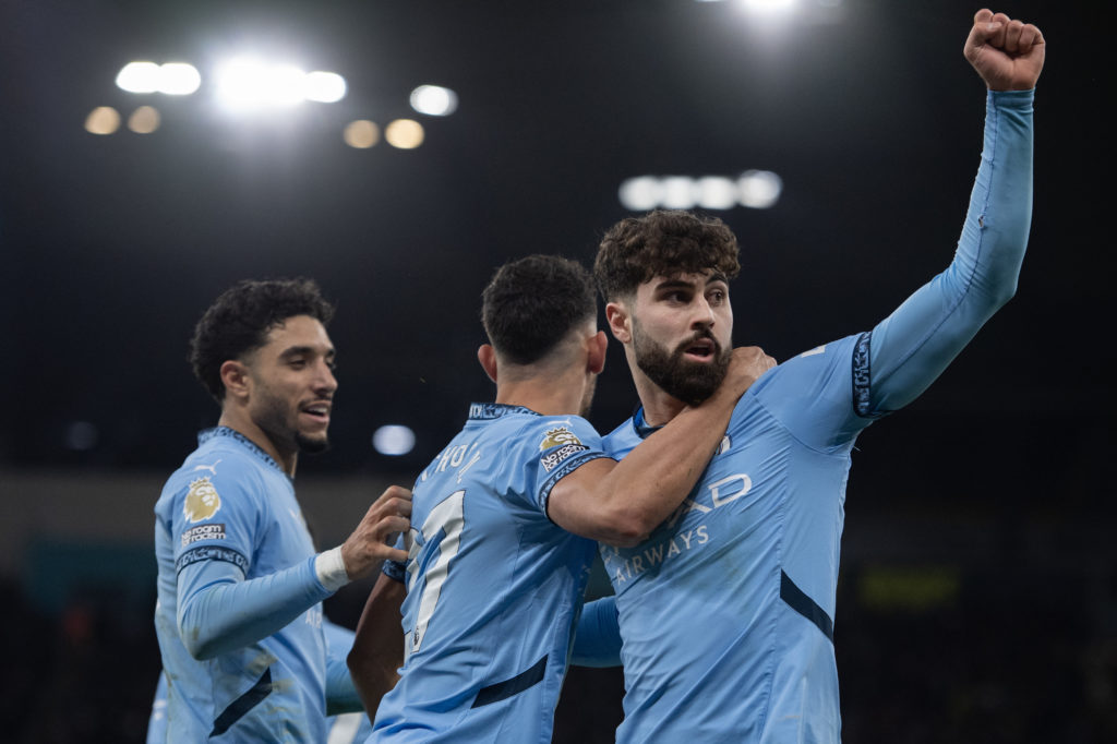 Josko Gvardiol of Manchester City celebrates scoring a goal with teammates Matheus Nunes and Omar Marmoush