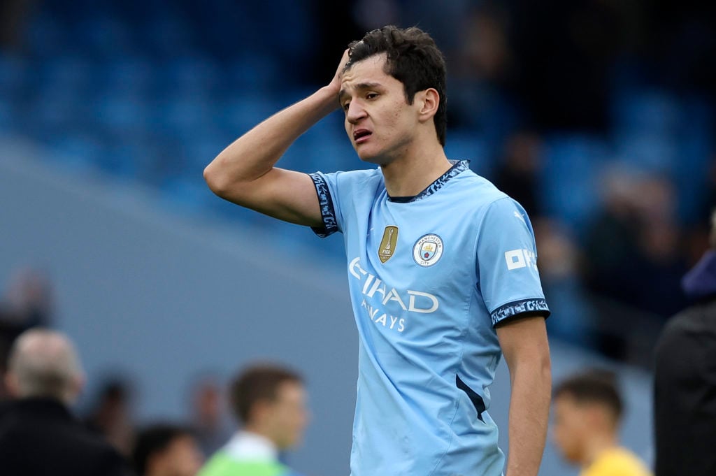 Manchester City's Abdukodir Khusanov looks concerned during Premier League match against Brighton