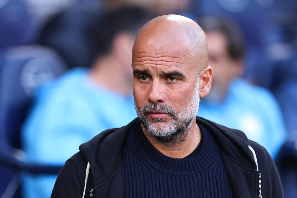 Pep Guardiola managing Manchester City in the Premier League against Wolves