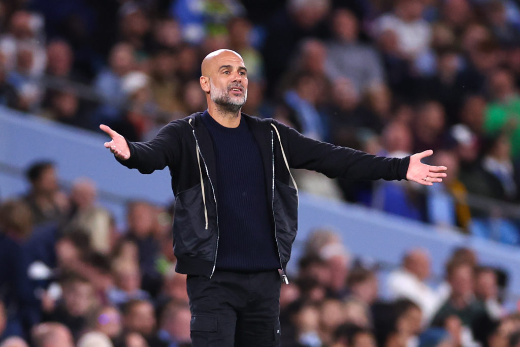 Pep Guardiola with his hands out during Manchester City FC v Wolverhampton Wanderers