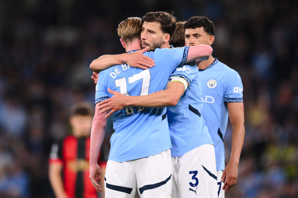Kevin De Bruyne being hugged by Ruben Dias in Manchester City v AFC Bournemouth