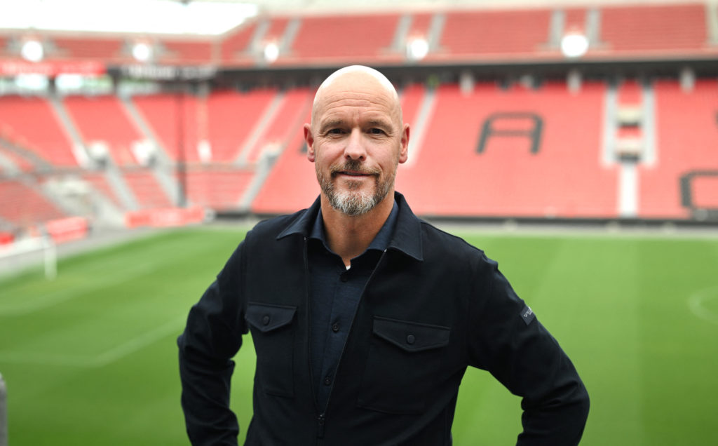 Erik ten Hag getting his photo taken at the BayArena.