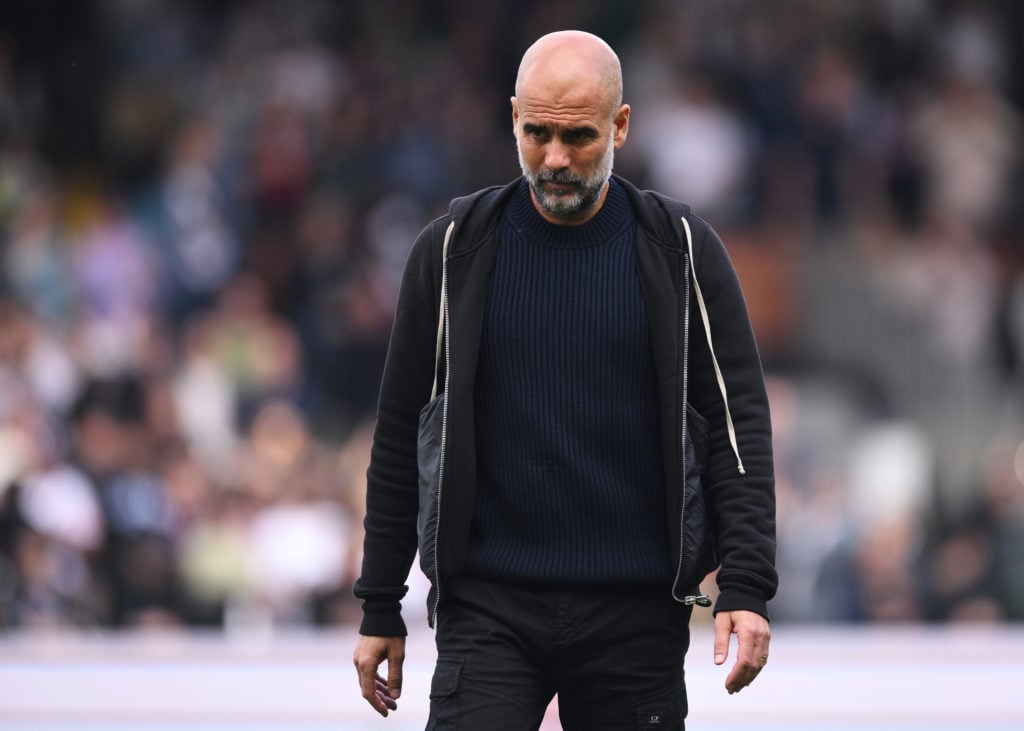 Pep Guardiola walking during Fulham FC v Manchester City FC