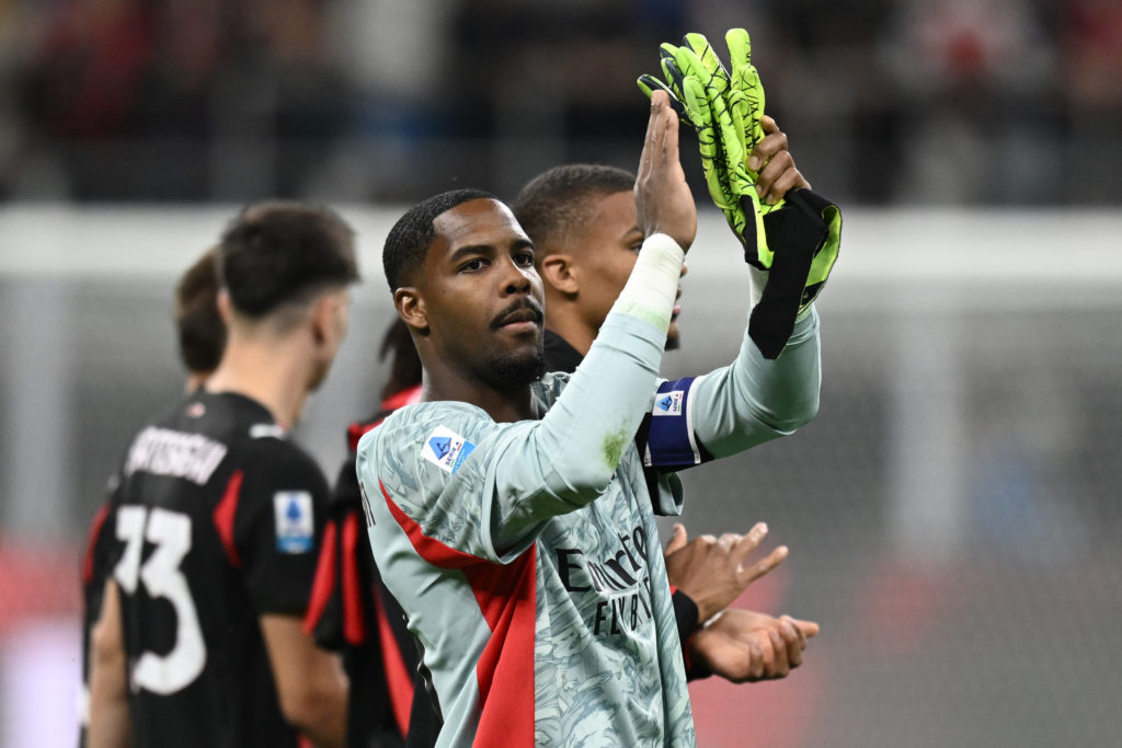 Mike Maignan clapping his hands after AC Milan v Monza