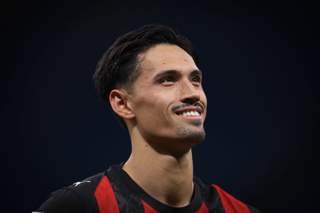 Tijjani Reijnders smiling during AC Milan v Monza.