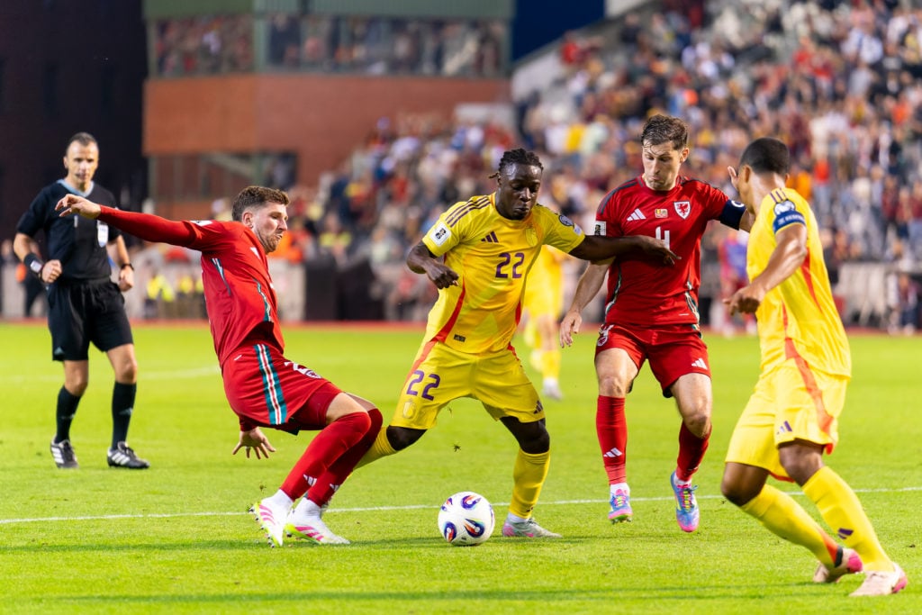 Jeremy Doku dribbles for Belgium against Wales.