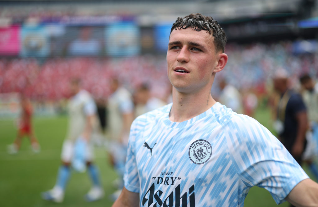 Phil Foden warming up ahead of Manchester City v Wydad AC at the FIFA Club World Cup.