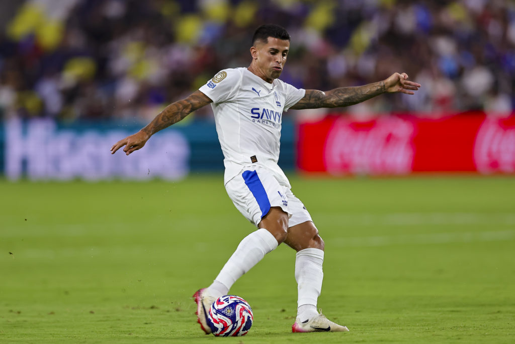 Joao Cancelo strikes the ball while playing for Al-Hilal.