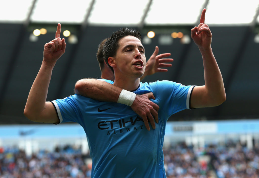 Samir Nasri celebrates after scoring for Man City against West Ham.