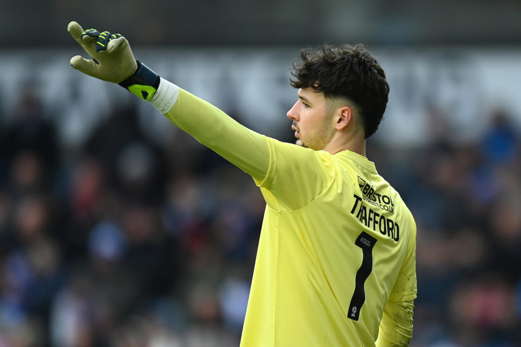James Trafford pointing when in action for Burnley against Blackburn.