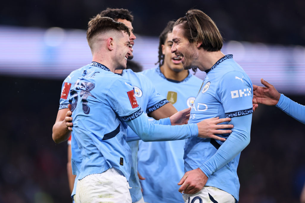Jack Grealish and James McAtee celebrating during Manchester City vs Salford City