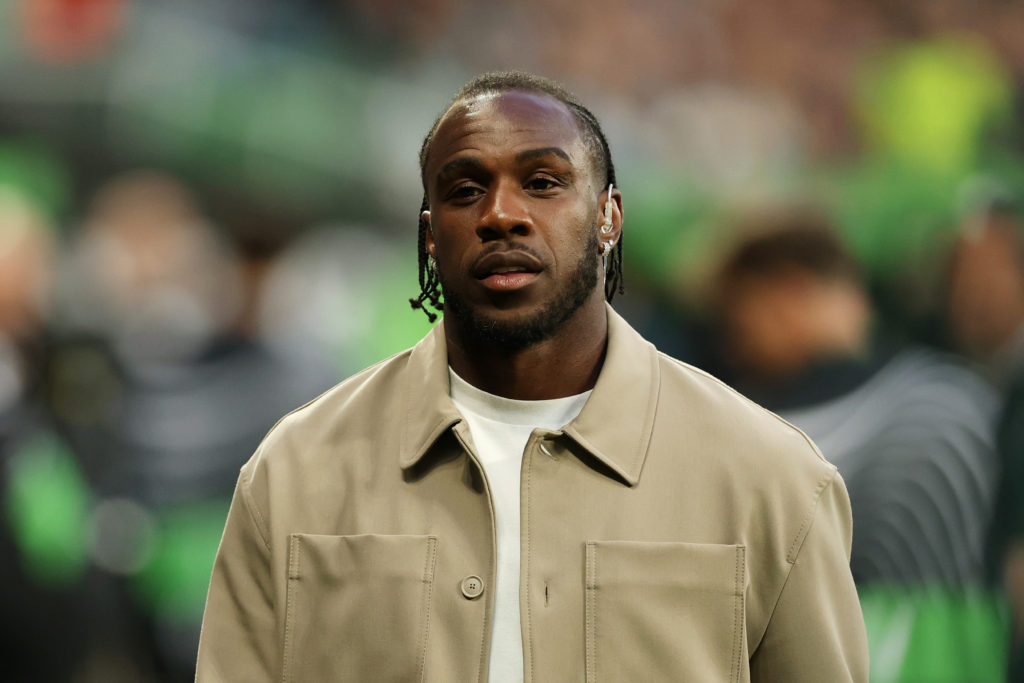 Michail Antonio working as a pundit during Real Betis v Chelsea.