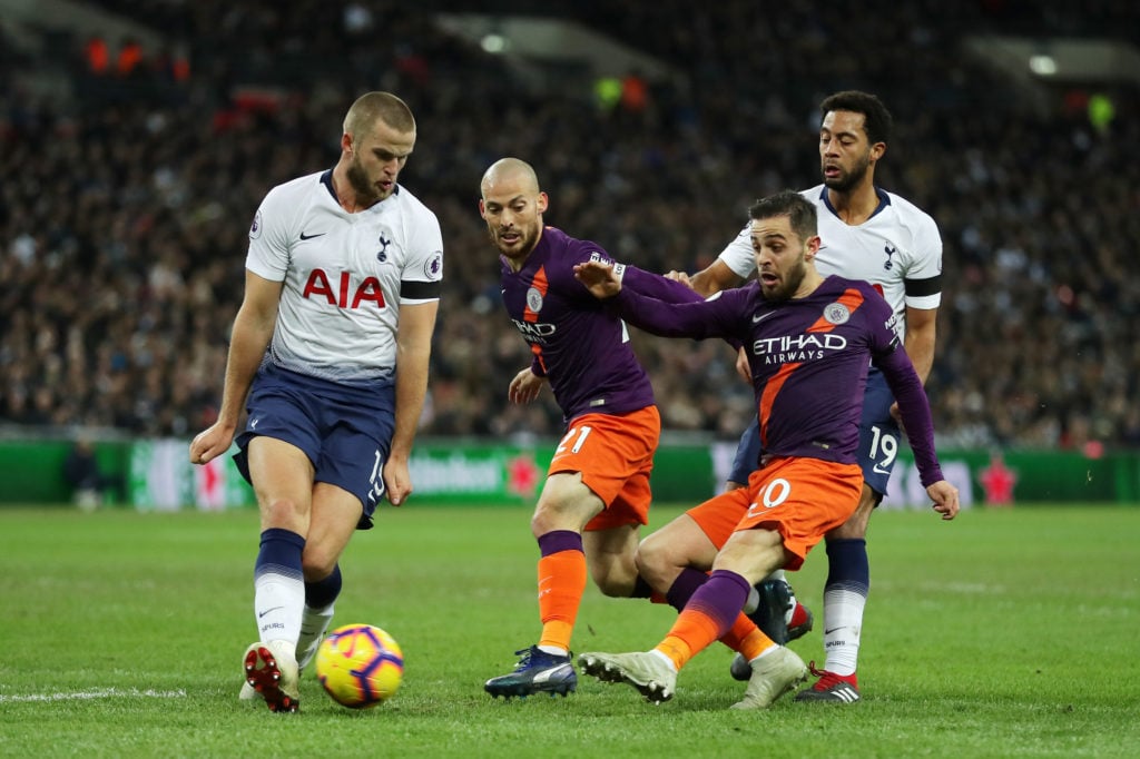Eric Dier of Tottenham Hotspur blocks Bernardo Silva of Manchester City shot during the Premier League match between Tottenham Hotspur and Manchester City at Wembley Stadium on October 29, 2018
