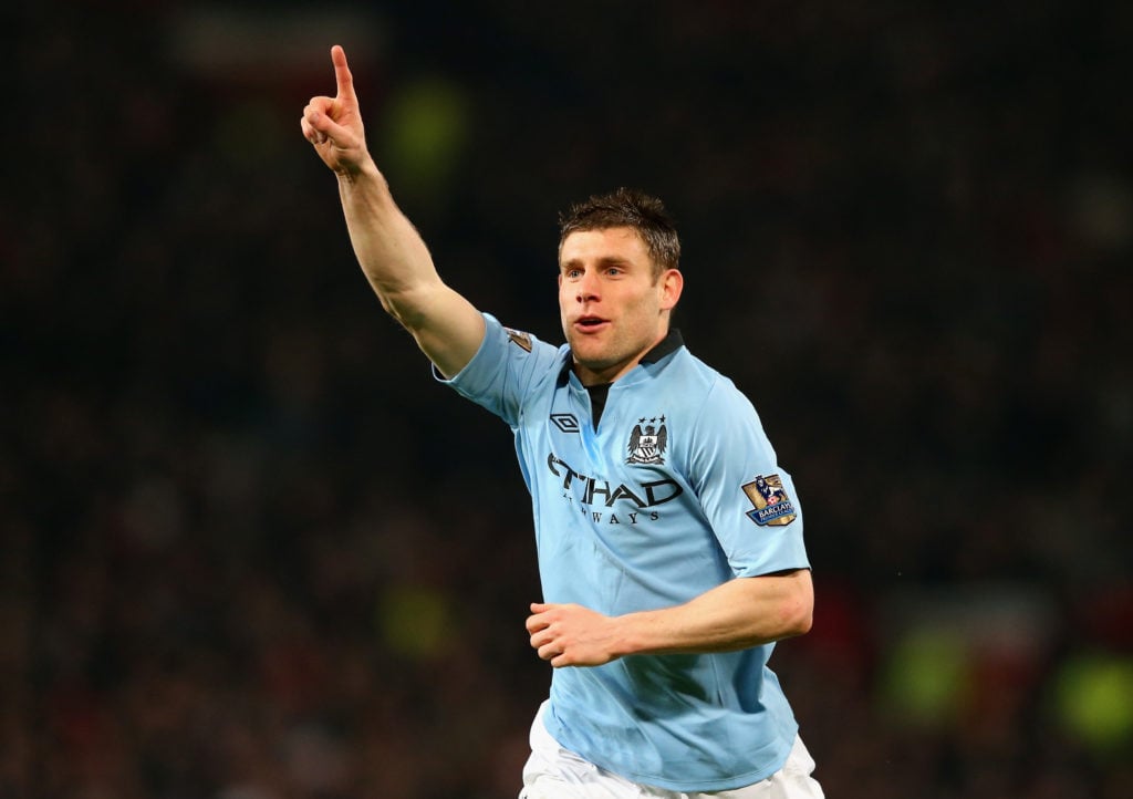 James Milner celebrates a goal during Manchester United v Manchester City.