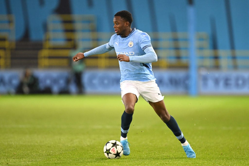 Justin Oboavwoduo of Manchester City runs with the ball during the UEFA Youth League match between Manchester City and Feyenoord at Joie Stadium on November 26, 2024