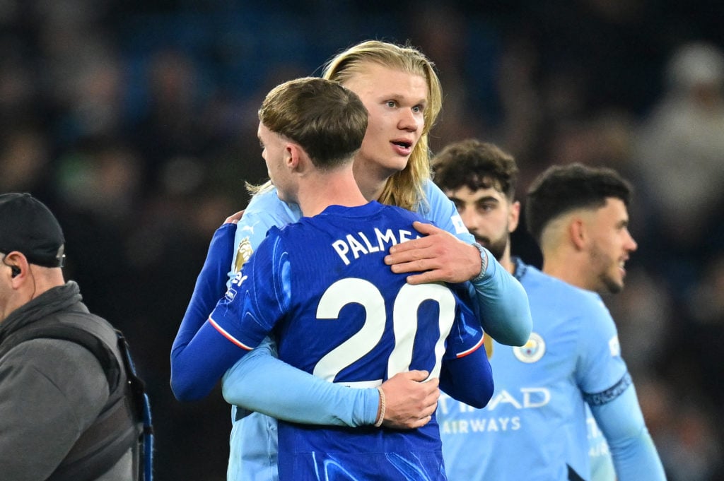 Erling Haaland of Manchester City and Cole Palmer of Chelsea interact after the Premier League match between Manchester City FC and Chelsea FC at Etihad Stadium on January 25, 2025