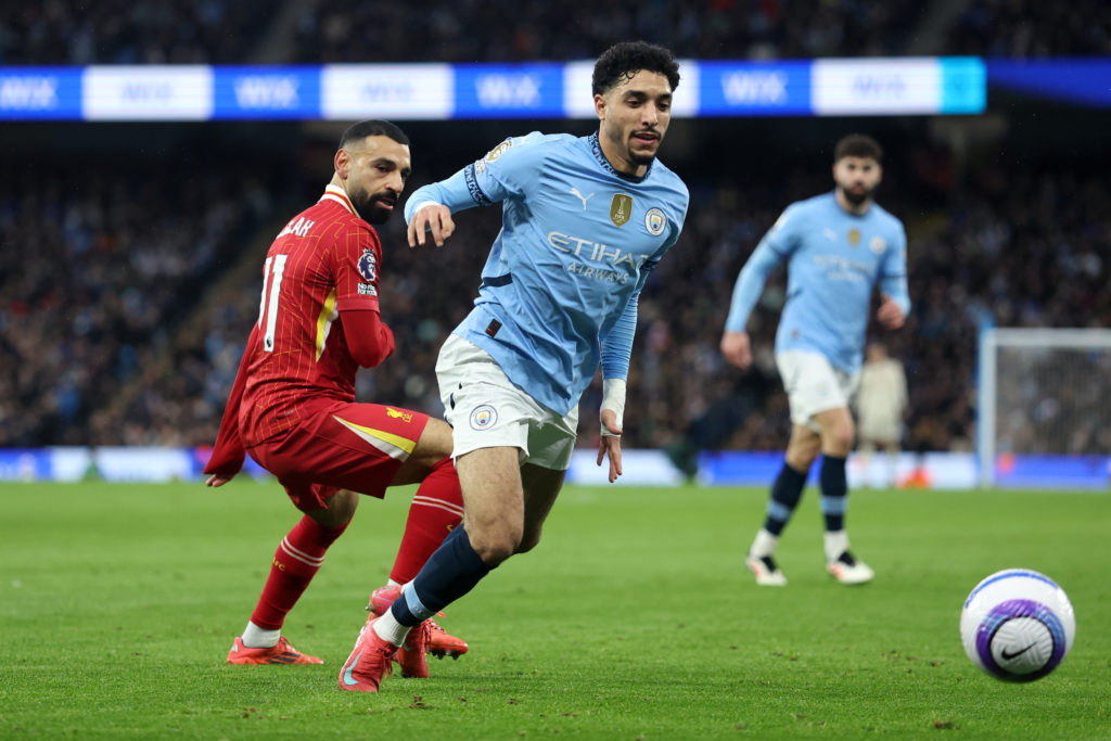 Omar Marmoush and Mohamed Salah in action during Manchester City v Liverpool.