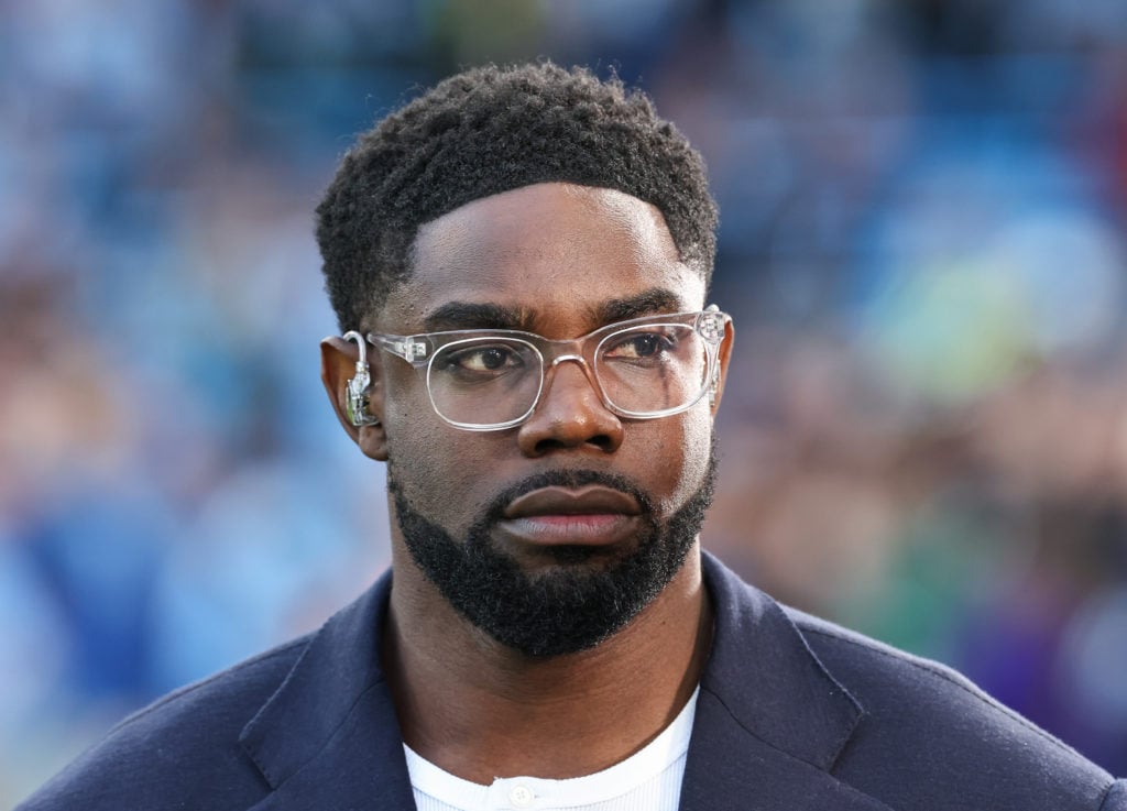 Micah Richards working as a pundit for a Premier League clash between Manchester City and Bournemouth.