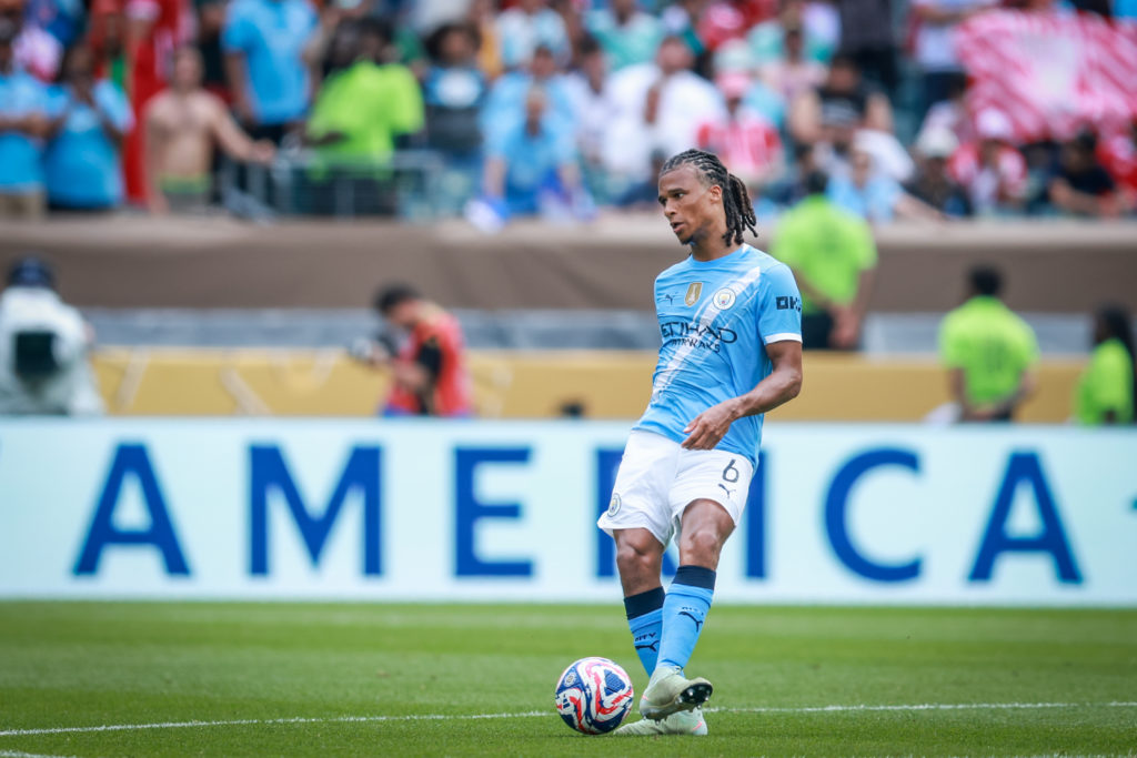 Nathan Ake passing the ball during Manchester City FC v Wydad AC