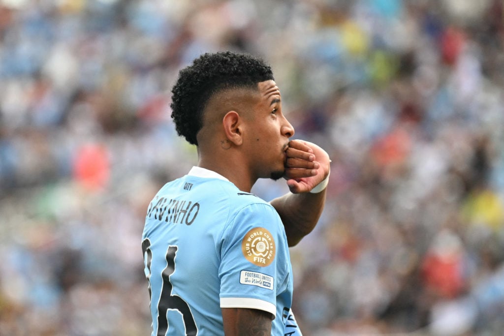 Savinho celebrates a goal for Man City by kissing his finger.