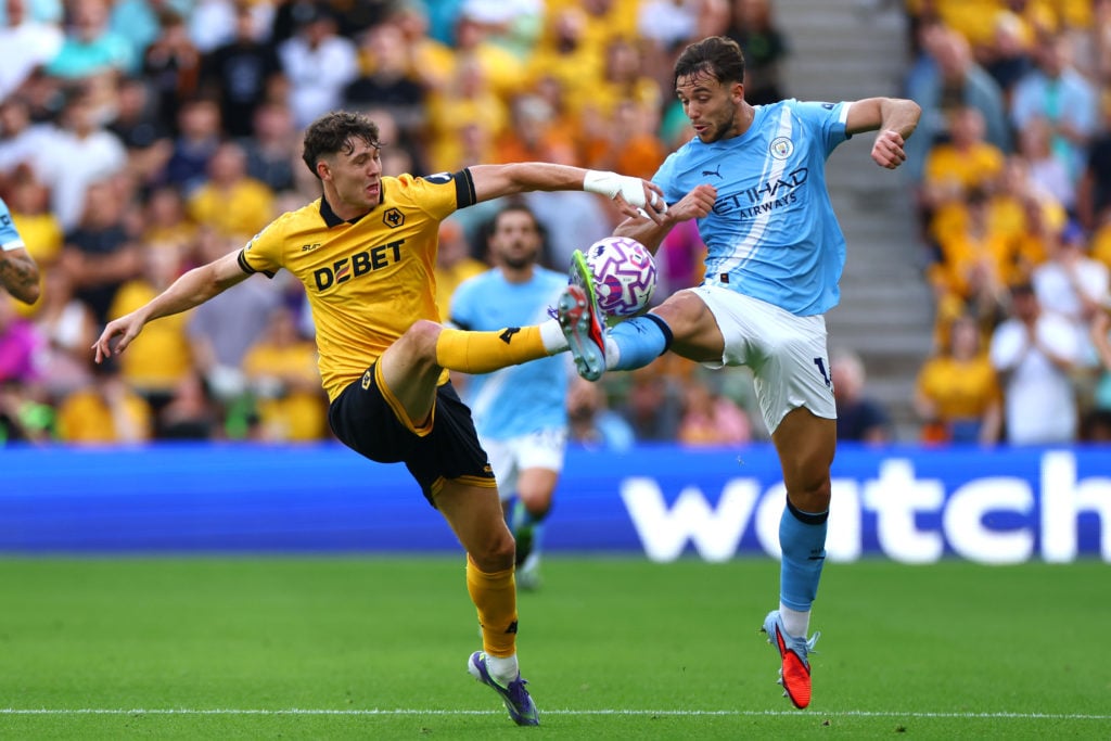 Nico Gonzalez and Jorgen Strand Larsen in action during Wolverhampton Wanderers v Manchester City