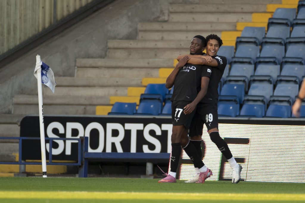 Justin Oboavwoduo of Manchester City F.C. celebrates his goal during the Vertu Trophy match between Oldham Athletic and Manchester City at Boundary Park in Oldham, England, on August 26, 2025