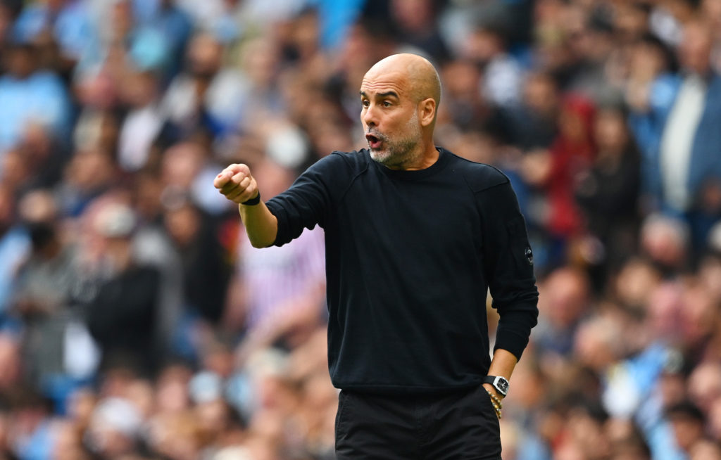 Pep Guardiola reacts during Manchester City v Tottenham Hotspur