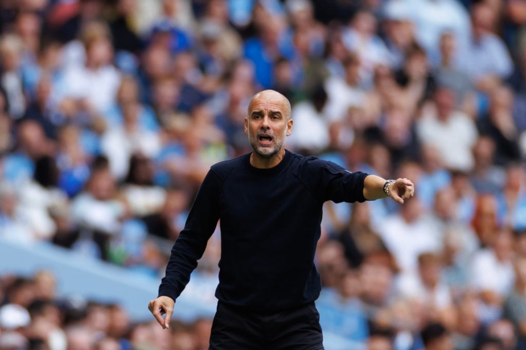 Pep Guardiola pointing during Manchester City v Tottenham Hotspur.